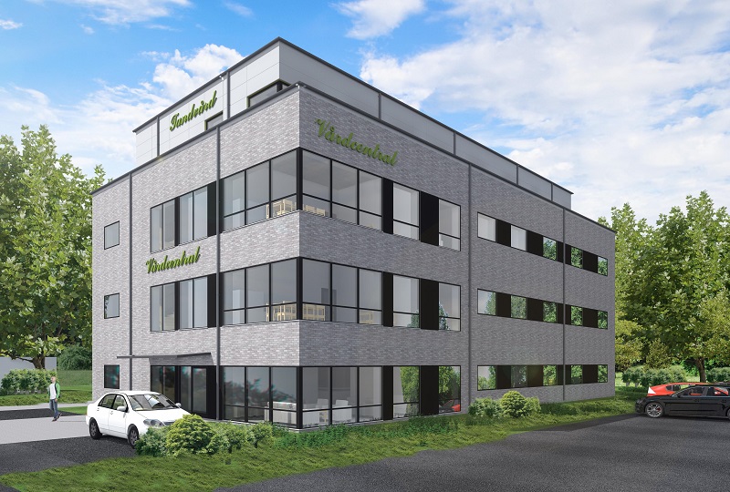 Visionsbild som visar hur den nya vårdcentralen i Söndrum är tänkt att se ut. Grå byggnad i fyra våningar med stora fönsterpartier.